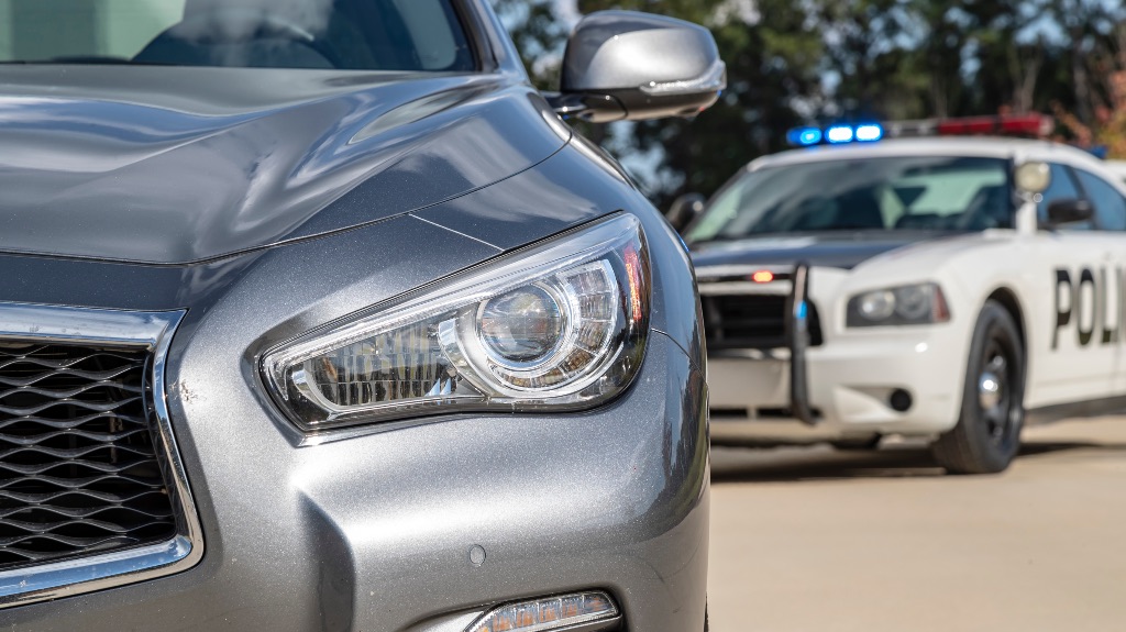 police officer pulling over a car