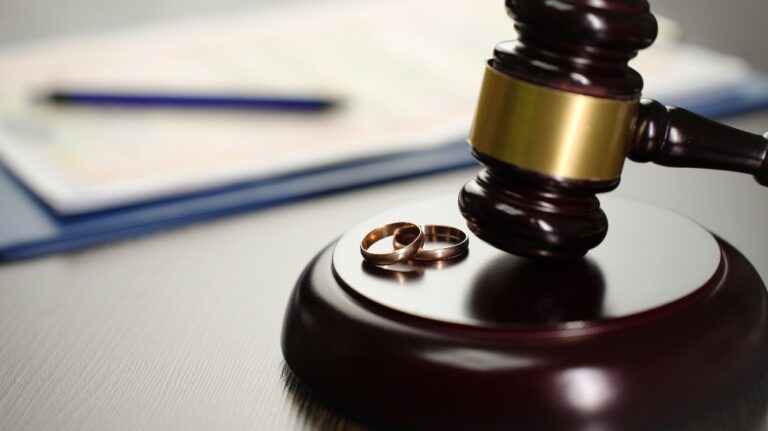 Gavel with two wedding bands